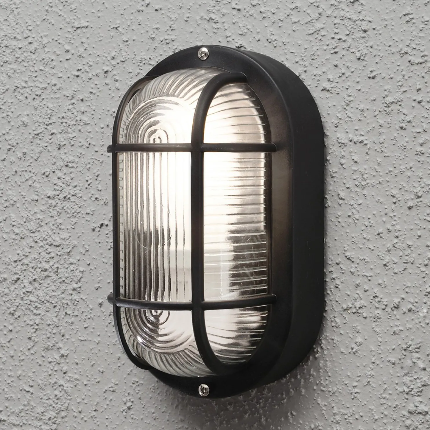 Seinävalaisin Konstsmide Elmas 7650-750 120x105x200 mm ovaali musta