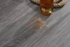 Vinyylilankku Habitas Flooring Dark Valley jäykkäydin askeläänieriste